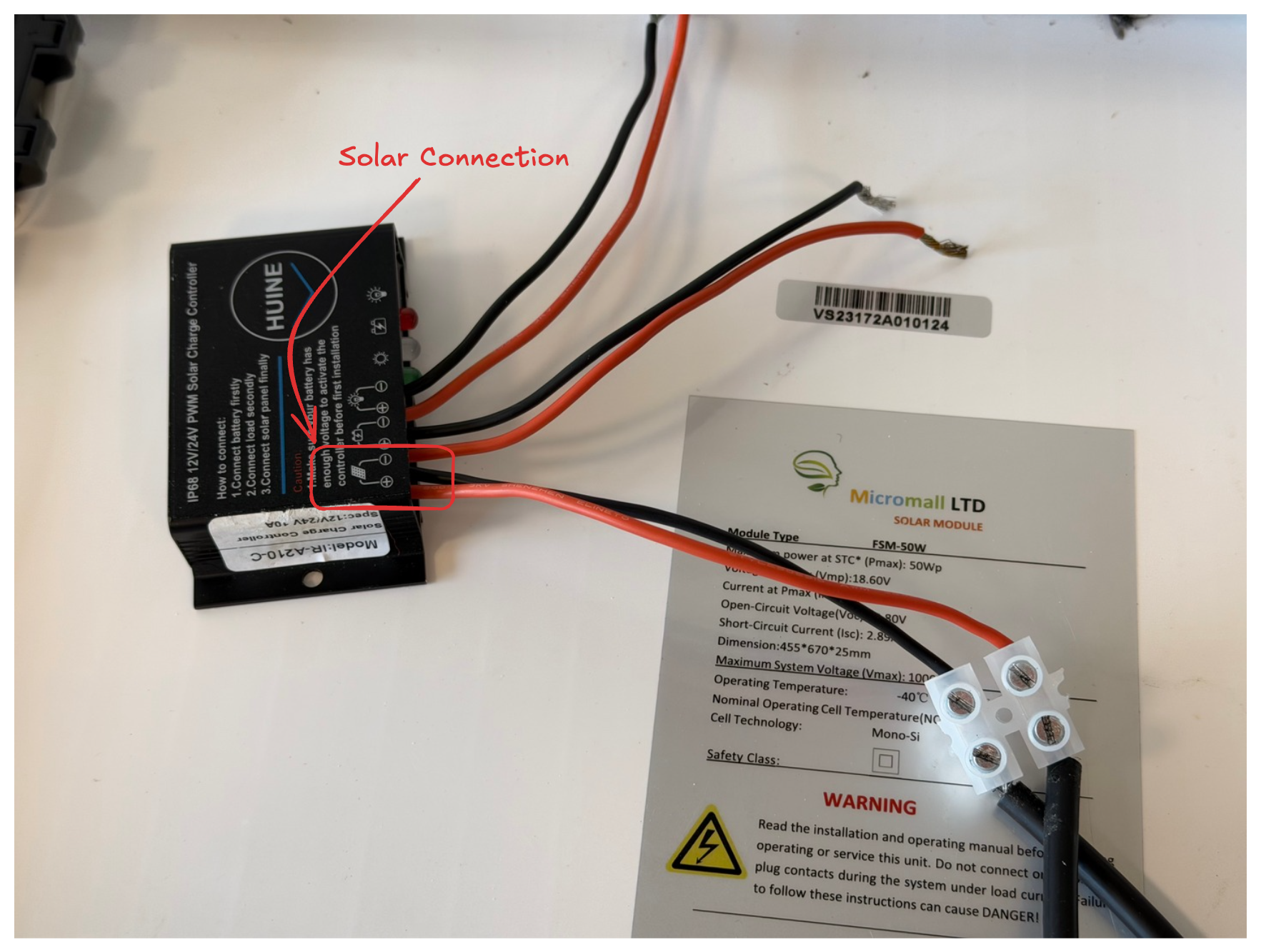 Photo showing the connection between the solar panels and solar controller. Photo showing the connection between the solar panels and solar controller.